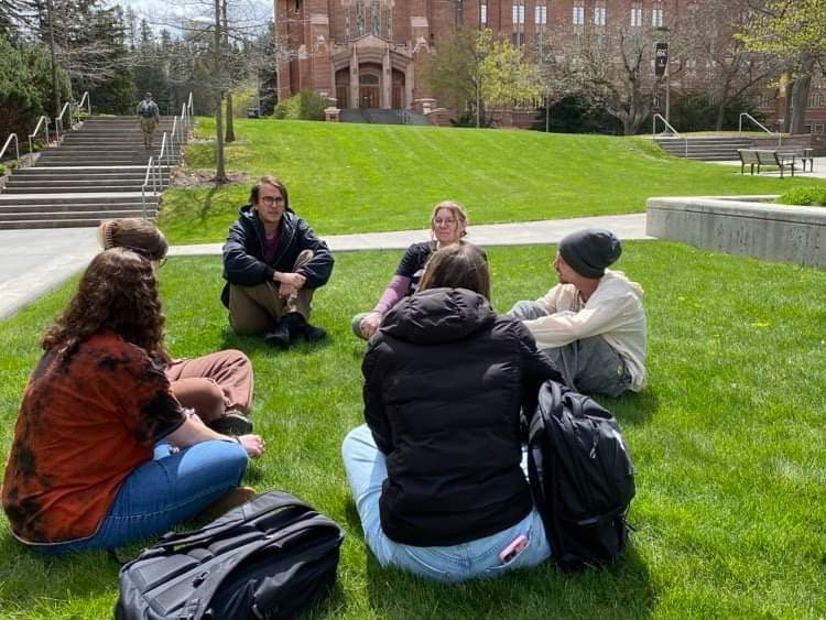 Adaptive Edge facilitating an outdoor group dialogue on a university campus