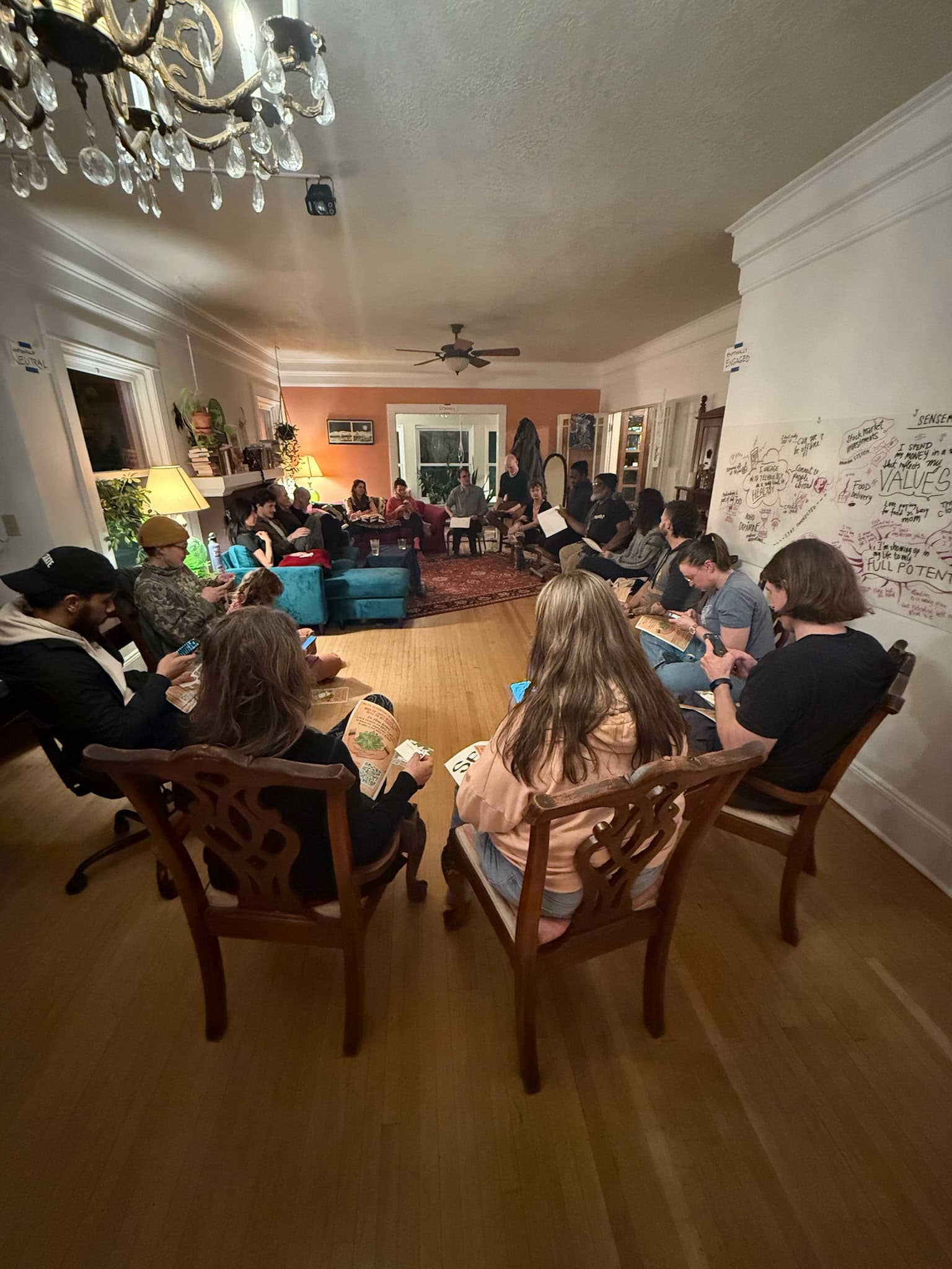 A Sense-Making Soiree gathering with participants in a circle dialogue